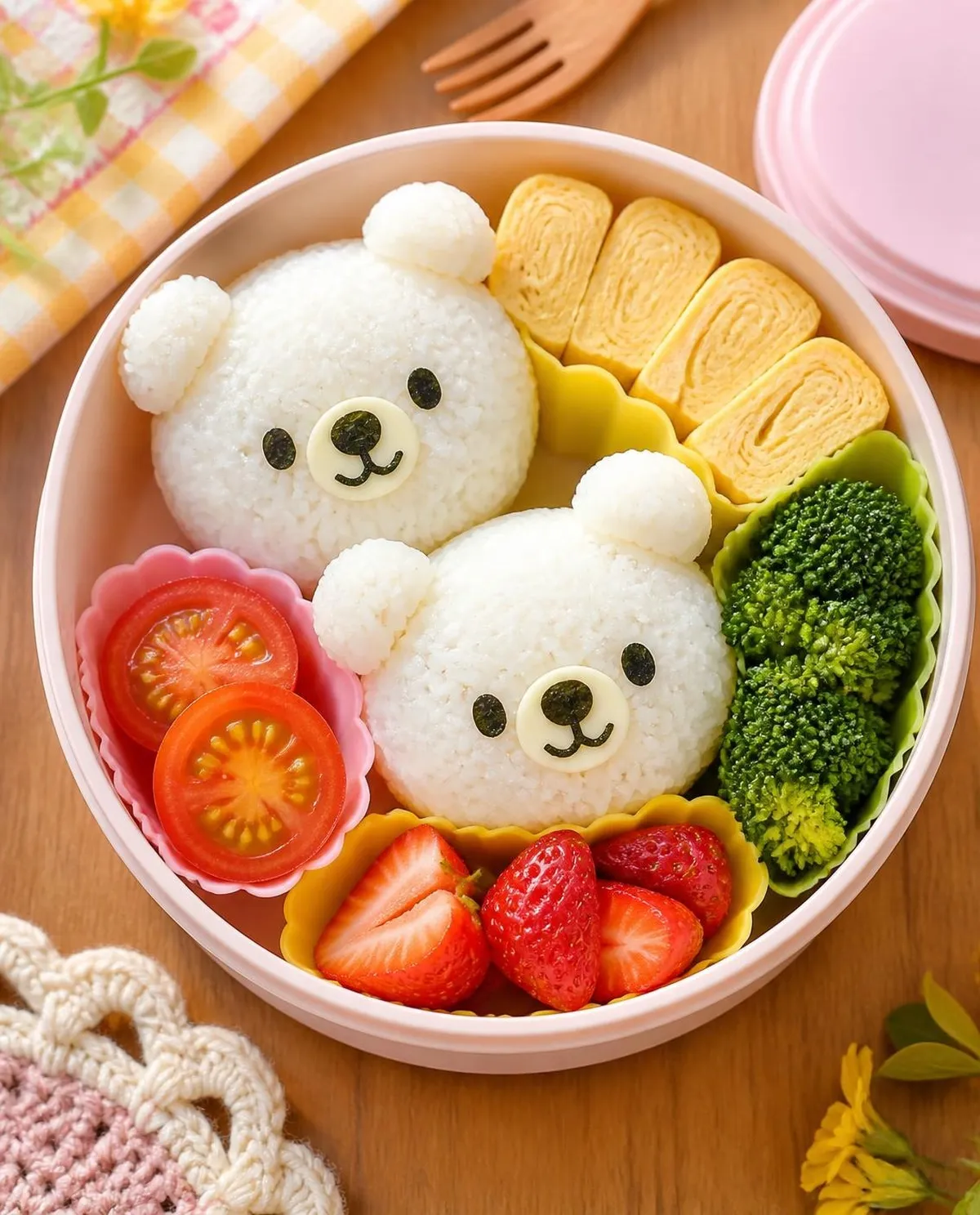 Overhead photo of Bear Face Onigiri packed in a colourful kids' lunchbox